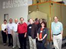 Standing next to the Aquila M8 Bus (L-R) Virginia Tech Hume Center Project Manager Sonya Rowe, KK4NLO; AMSAT Vice President-Engineering Jerry Buxton N0JY; Hume Center Director of Research Bob McGwier, N4HY; Qualcomm Co-Founder Franklin Antonio, N6NKF; AMSAT Board member and President Emeritus Tom Clark, K3IO; Qualcomm retiree Michelle Thompson, W5NYV, and Qualcomm retiree Phil Karn, KA9Q.